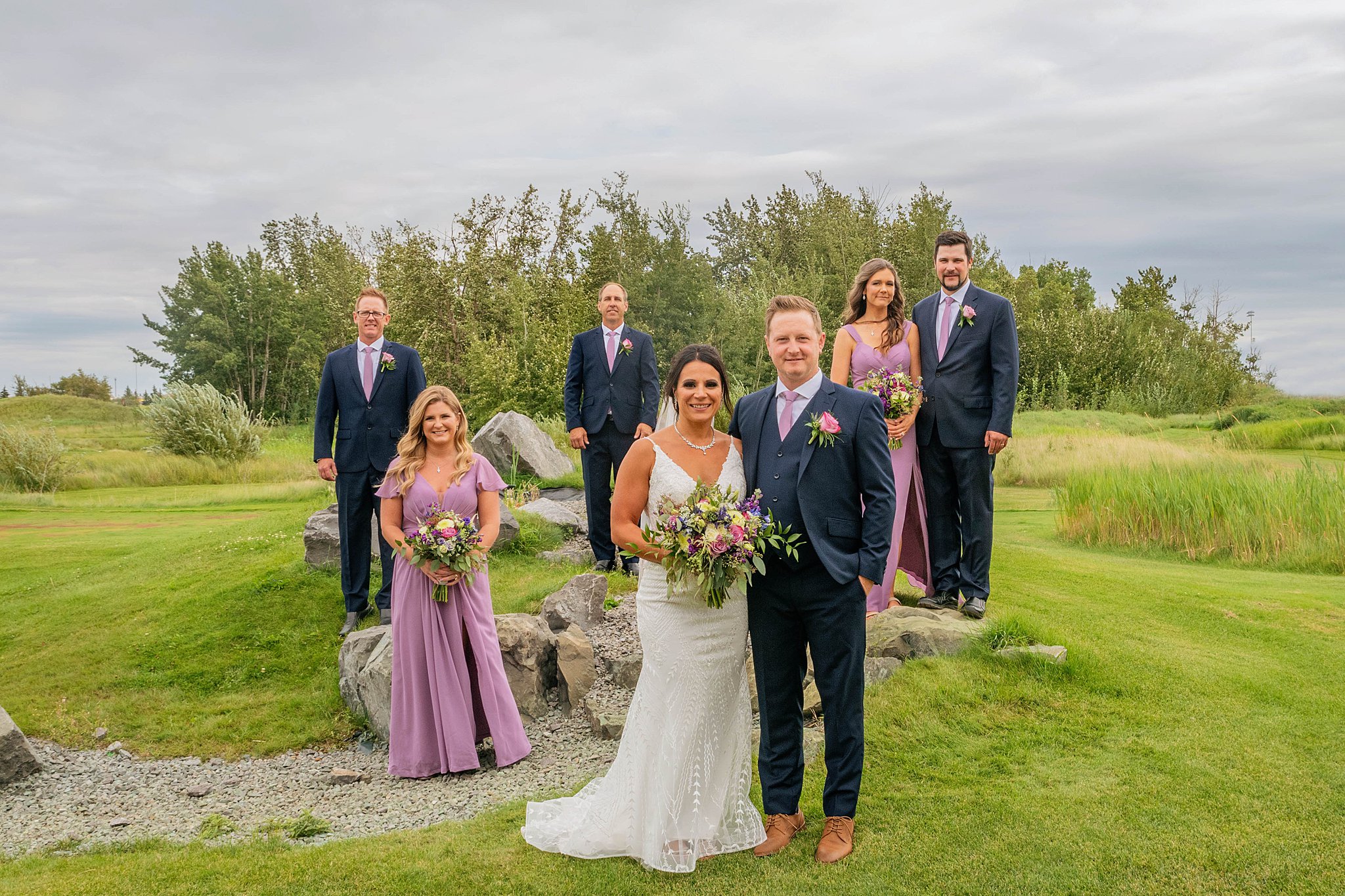 bride and groom with the wedding party Edmonton Golf Course Wedding Venues