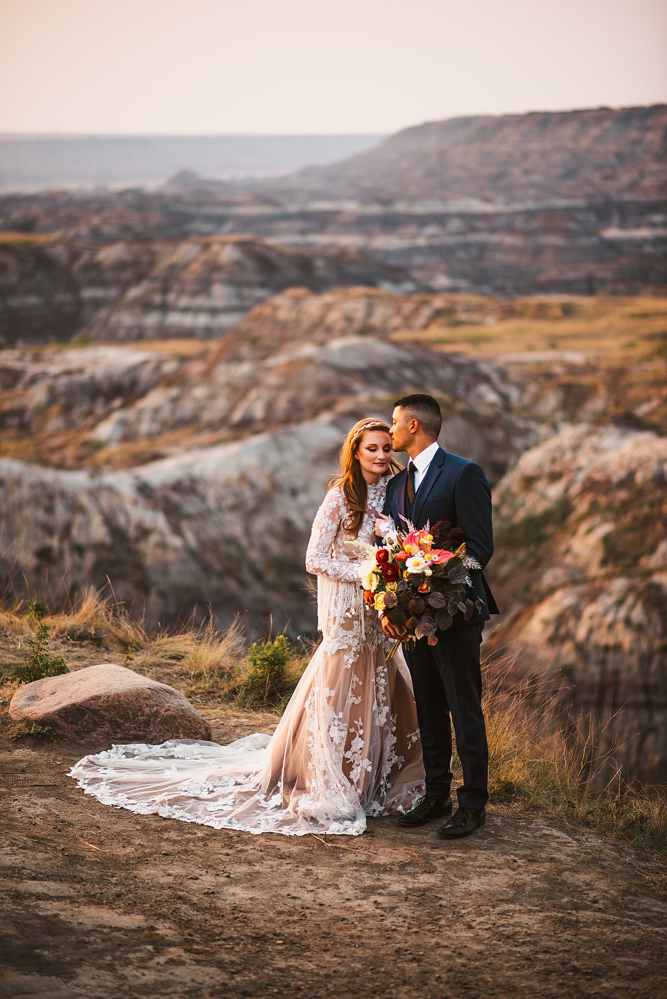 bride and groom standing on the mountainside Small Wedding Venues in Edmonton